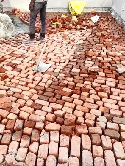We often use traditional techniques like Brickbat Coba for waterproofing. This time-tested method provides excellent waterproofing and thermal insulation for flat roofs. It's a labor-intensive process, but we believe it offers the best long-term solution.