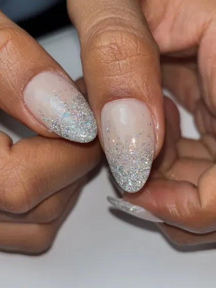 A close-up of the falling glitter design. The mix of fine and chunky silver glitter creates a beautiful, textured effect.