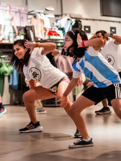 Getting our move on with the community. Here I am in a dance session with a young runner, part of our "Move For The Planet" initiative. Every bit of movement counts.