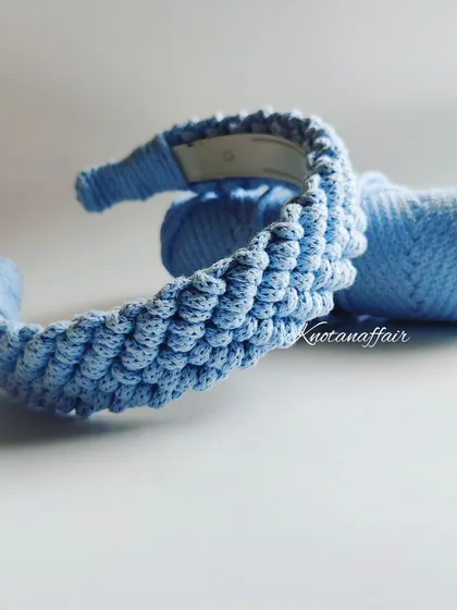 If you're looking for unique accessories, this pretty handmade macrame hairband in a lovely shade of blue is a great choice. It's customizable in your favorite colors.