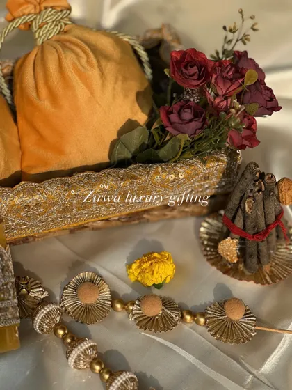 This image shows the complete yellow-themed Lohri hamper, including a miniature bonfire, capturing the full essence of the festival in one beautiful arrangement.