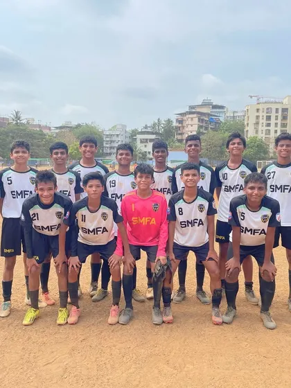 A team photo of one of our youth squads with their coach. Unity and determination are at the core of our training.