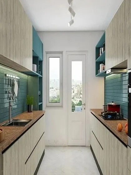 A galley kitchen featuring a mix of light wood-grain cabinets and teal accents. The textured blue backsplash and hanging utensil rack add both style and practicality.