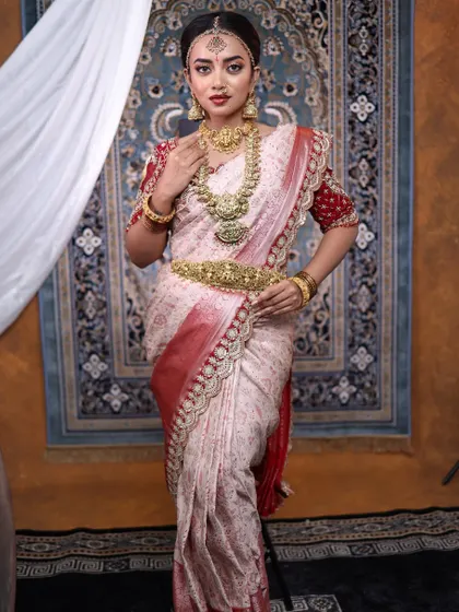 A full-length view showing how a complete temple jewellery set elevates the entire bridal outfit. This bride looks absolutely majestic from head to toe.