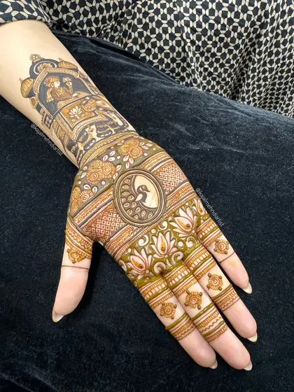 The stained version of the full hand design, showing the beautiful contrast between the dark figures and the lighter, intricate patterns.