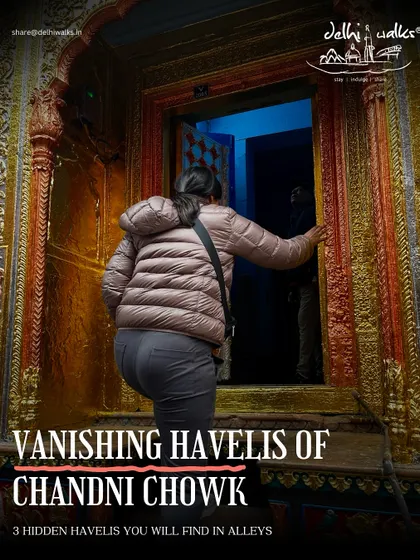 A participant enters one of the hidden havelis in Chandni Chowk. Our walks offer a rare chance to step inside these historic buildings and experience their silent, fading beauty.