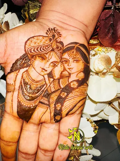 A close up of the Radha Krishna portrait. The fine lines and shading bring the figures to life, creating a piece of art that is both beautiful and meaningful.