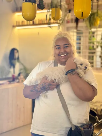 A happy client and her even happier fur baby. We love it when you bring your pets along. Our salon is a safe and welcoming space for all members of your family, especially the four-legged ones.