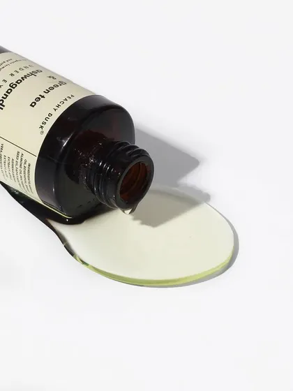 A product shot showing the pure, rich texture of my Green Tea and Ashwagandha Under Eye Oil. It's designed to be gently massaged into the delicate under-eye area for deep nourishment.