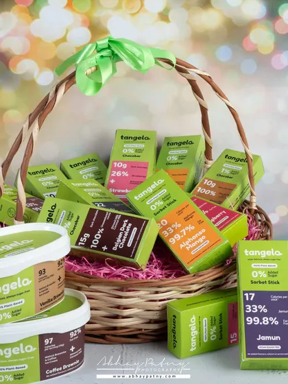 This shot presents a brand's products as a festive gift basket. It’s a powerful commercial image that helps customers visualize the products as a complete gifting solution for holidays or celebrations.