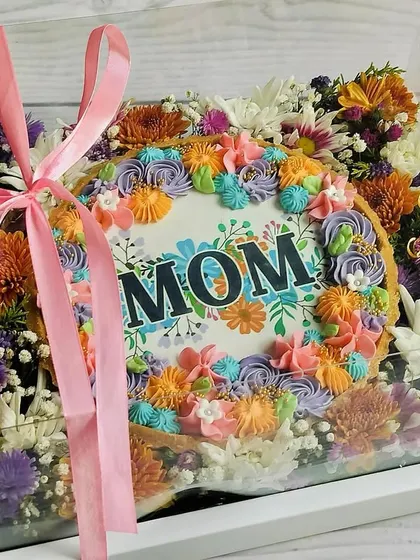 The complete Mother's Day Chocolate Tart Hamper, packaged in a clear box and tied with a pink ribbon, ready for gifting.