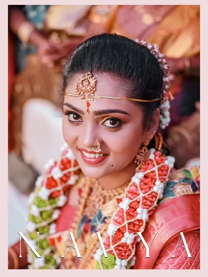 A radiant close-up of the bride on her wedding day, her happy smile and beautiful traditional jewelry shining.