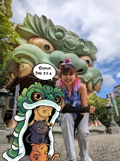 Posing in front of the giant lion head at Namba Yasaka Shrine in Osaka. I added a cute little cat dragon dance illustration to the photo.