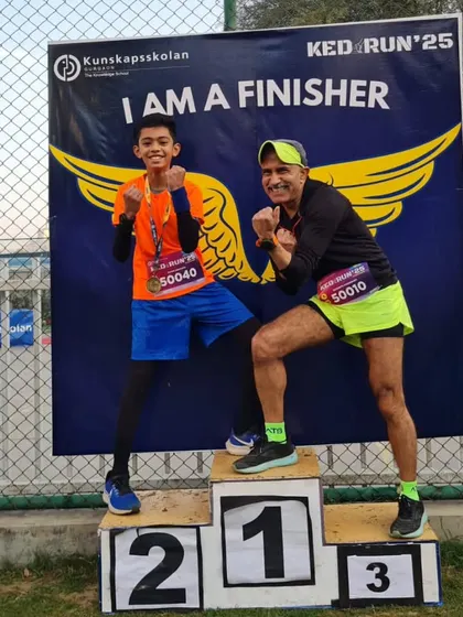 Our youngest star, Avyan, on the podium at KED RUN'25. We believe in nurturing champions from a young age.