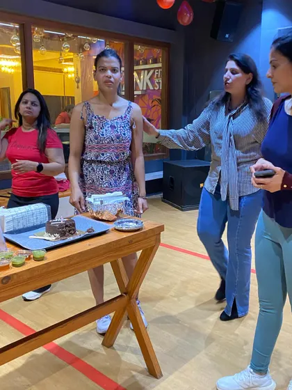 Getting the cake ready for our Women's Day celebration. It's the small things that make our community feel like family.
