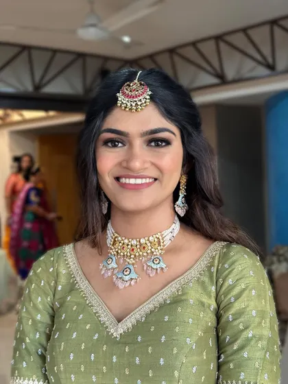 A smiling portrait of this client, looking happy and radiant.