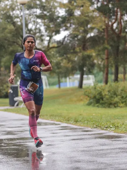 The run leg of the Ironman 70.3 in Tallinn, Estonia. Racing in cold and rainy conditions tests your mental and physical preparation. I fought to the end, and this is the grit I instill in my athletes.