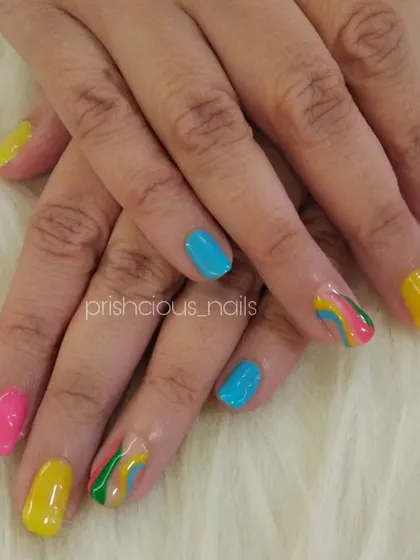 Another shot of the colorful vacation manicure. These nails are guaranteed to make you smile.