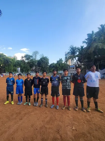 Our football team lines up on the field, ready for the All Sports Tournament. This image captures the unity and determination of our players before a big game.
