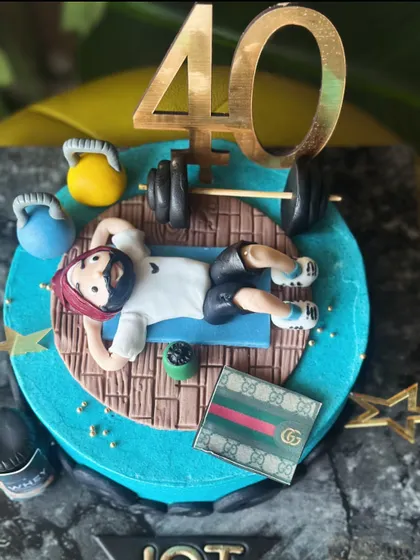 Built with butter, not biceps. A gym-themed cake for the one who lifts heavy and celebrates harder, complete with fondant kettlebells, barbells, and a protein shaker.