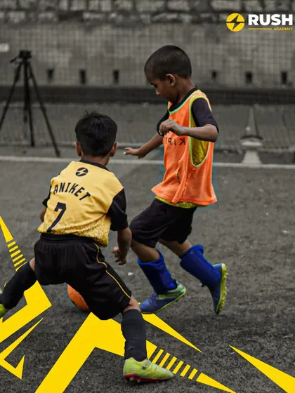 Two players compete for the ball in a training match.