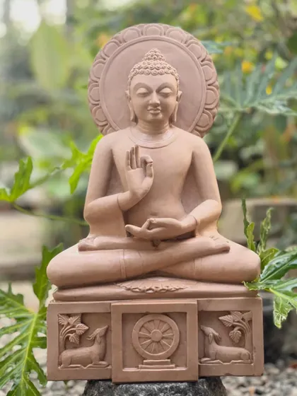 The full view of our Gautama Buddha statue in pink sandstone, a serene and beautifully proportioned piece for any sacred space.