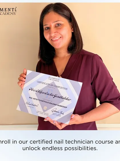 Enroll in our certified nail technician course and unlock endless possibilities. A proud student holds her certificate of completion.