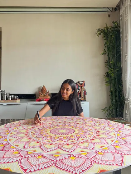 I never knew warm shades could look this good. Working on a vibrant pink and yellow mandala that brought so much warmth and happiness to the client's space.