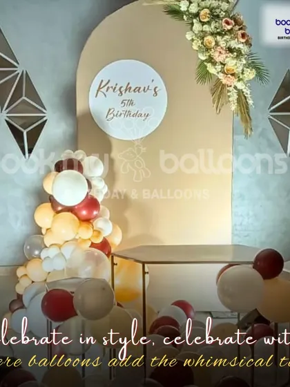 This elegant setup for Krishav's fifth birthday is a great example of how we help you celebrate in style. The sophisticated color palette and floral accents create a whimsical and classy touch.