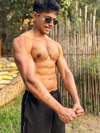 A physique check outdoors. My goal is to maintain a lean, athletic body year-round, not just for a specific season. This is the result of consistent habits.