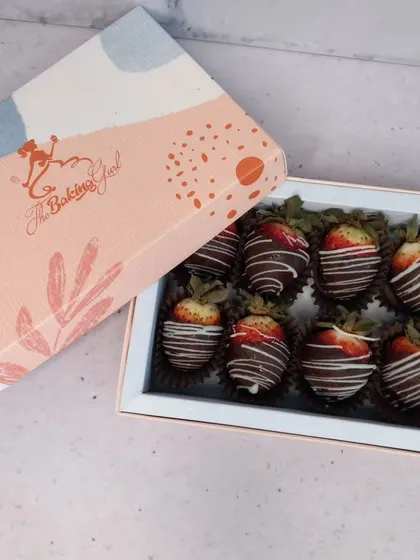 A box of my classic chocolate-dipped strawberries, drizzled with white chocolate. A simple, elegant, and delicious way to enjoy the season.