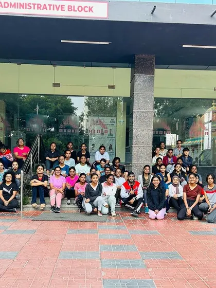 Posing with the wonderful group of women after a successful campus dance event. Building a sense of community and shared accomplishment is a key part of every session I lead.