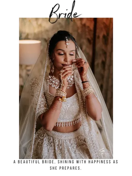"A beautiful bride, shining with happiness as she prepares." This portrait captures a quiet moment of reflection as the bride puts on her nose ring.