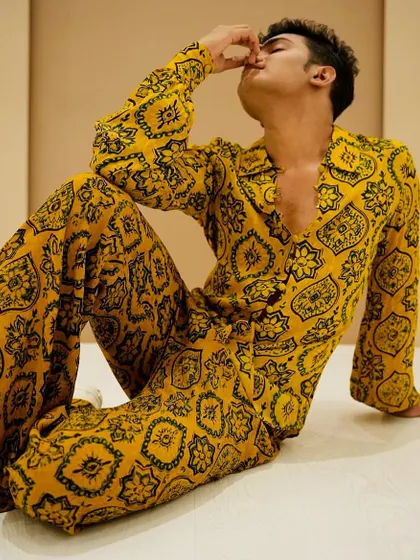 A high-fashion look for Niraj Patel. The makeup here is more stylized to match the designer outfit and the editorial concept of the photoshoot.