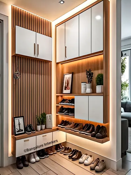 This L-shaped entryway unit maximizes corner space, providing ample storage for shoes, bags, and outerwear with beautiful accent lighting.