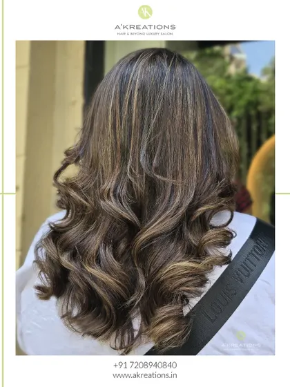 Fresh highlights to light up your look. This style adds dimension and brightness for a perfect hair refresh.