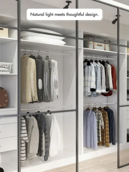 Natural light meets thoughtful design in this walk-in closet. The open shelving and hanging spaces are designed to be both beautiful and practical, making it easy to see and organize your entire wardrobe.
