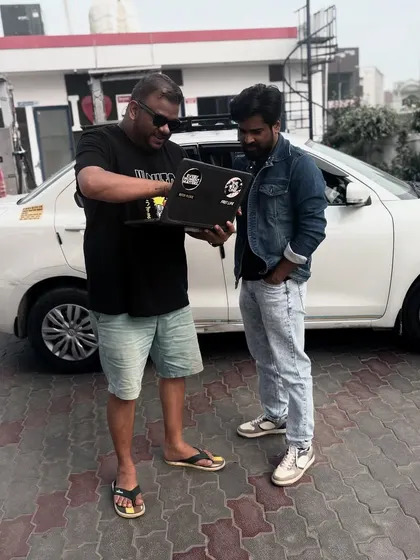 Even on the road, the work continues. Here I am showing some new music to my partner.