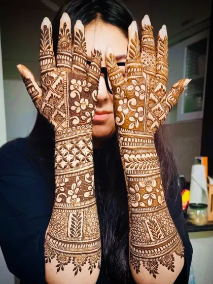 A full view of a heavy back-of-hand design, perfect for a bride or for festive occasions like Eid or Diwali.