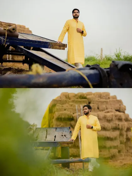 The groom poses against haystacks, adding a rustic and authentic charm to his Haldi day portraits.