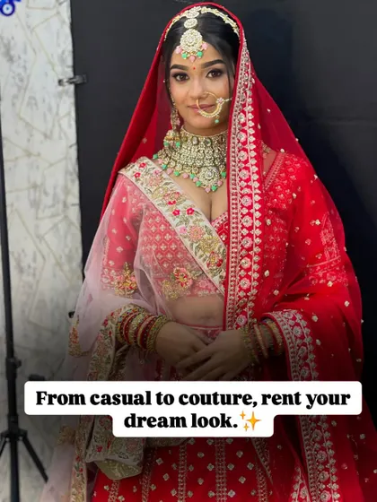 A classic red bridal lehenga available for rent. This look is complete with a double dupatta for that traditional layered effect.