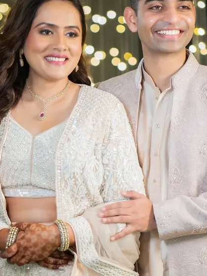 A close-up of the sangeet look. The makeup is natural and enhances her features, perfect for a long night of festivities.