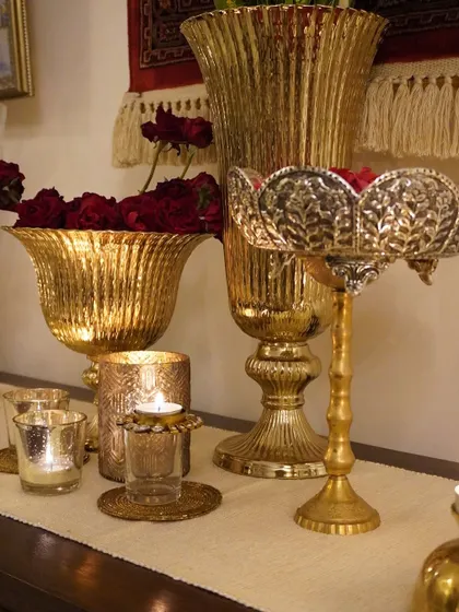 More details of my Diwali decor. The intricate design of the silver and gold urlis adds a touch of luxury.