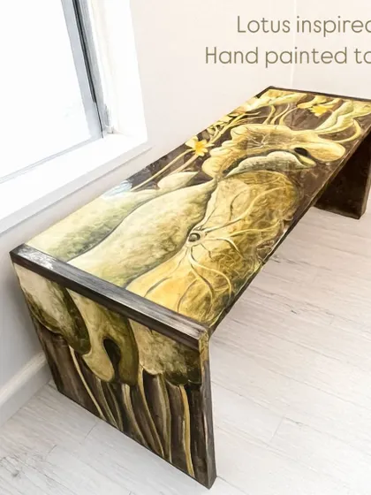 Our lotus-inspired table, a stunning piece of functional art. The entire surface is hand-painted, transforming a simple bench into a celebration of nature and Indian craftsmanship.
