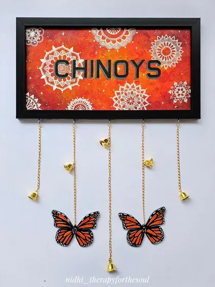 A duplicate shot of the 'Chinoys' nameplate, showing the vibrant colors.