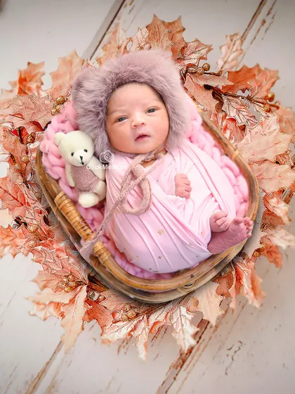 Here, the same setup is enhanced with a digital backdrop of autumn leaves, showing how I can add a creative touch to a classic portrait.