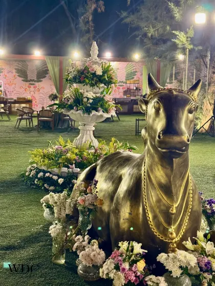 We incorporated traditional elements with a grand floral fountain and a beautiful Nandi sculpture, adorned with garlands, to add a touch of cultural richness to the decor.