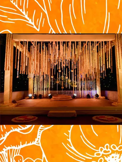 This is a glimpse of a traditional Haldi ceremony I designed. The stage features beautiful hanging floral strings made of marigolds, creating a classic and festive setting for this important pre-wedding ritual.