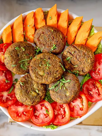 The Gourmet Grub Harabhara Kebab, a healthy and delicious vegetarian snack made from spinach, peas, and potatoes.