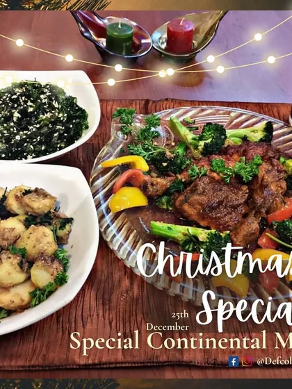 Our Christmas special continental meal, a festive platter featuring Continental Chicken, Crackling Spinach with Sesame Seeds, Parsley Aloo, and Garlic Bread.